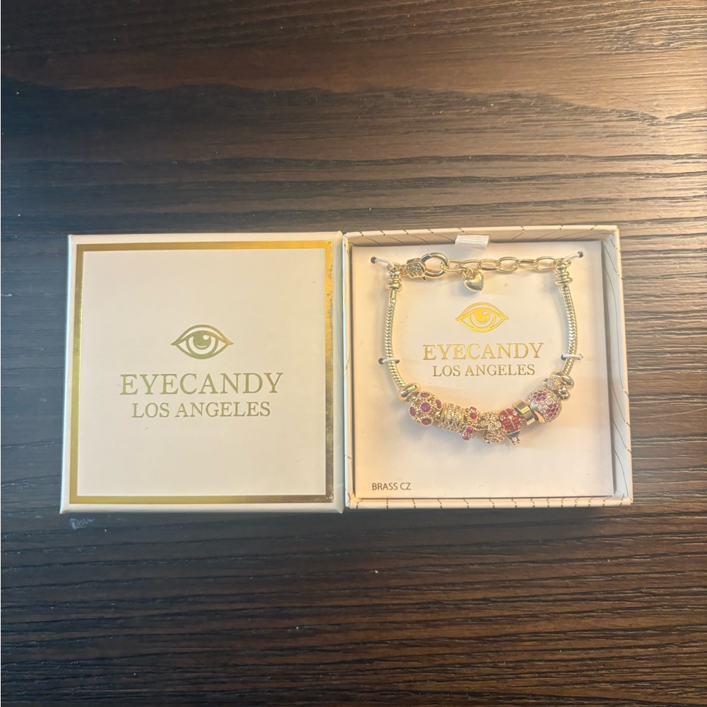 NEW Eye Candy gold charm bracelet